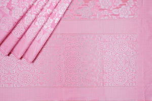 Pink fabric with white floral patterns