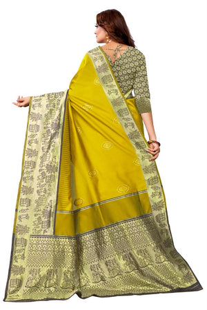 Woman wearing a yellow saree with black patterns on a white background