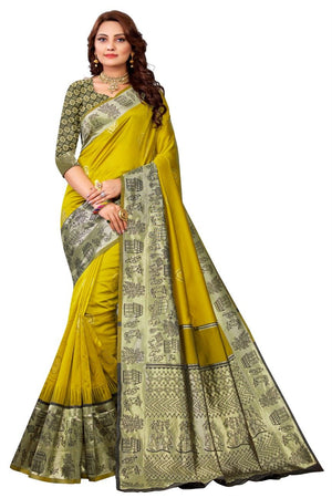 Woman wearing a yellow saree with black and white patterns on a white background