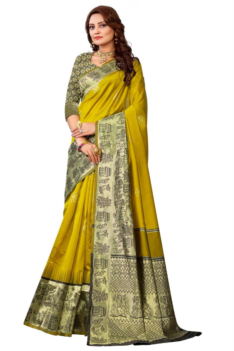 Woman wearing a yellow saree with black and white patterns on a white background
